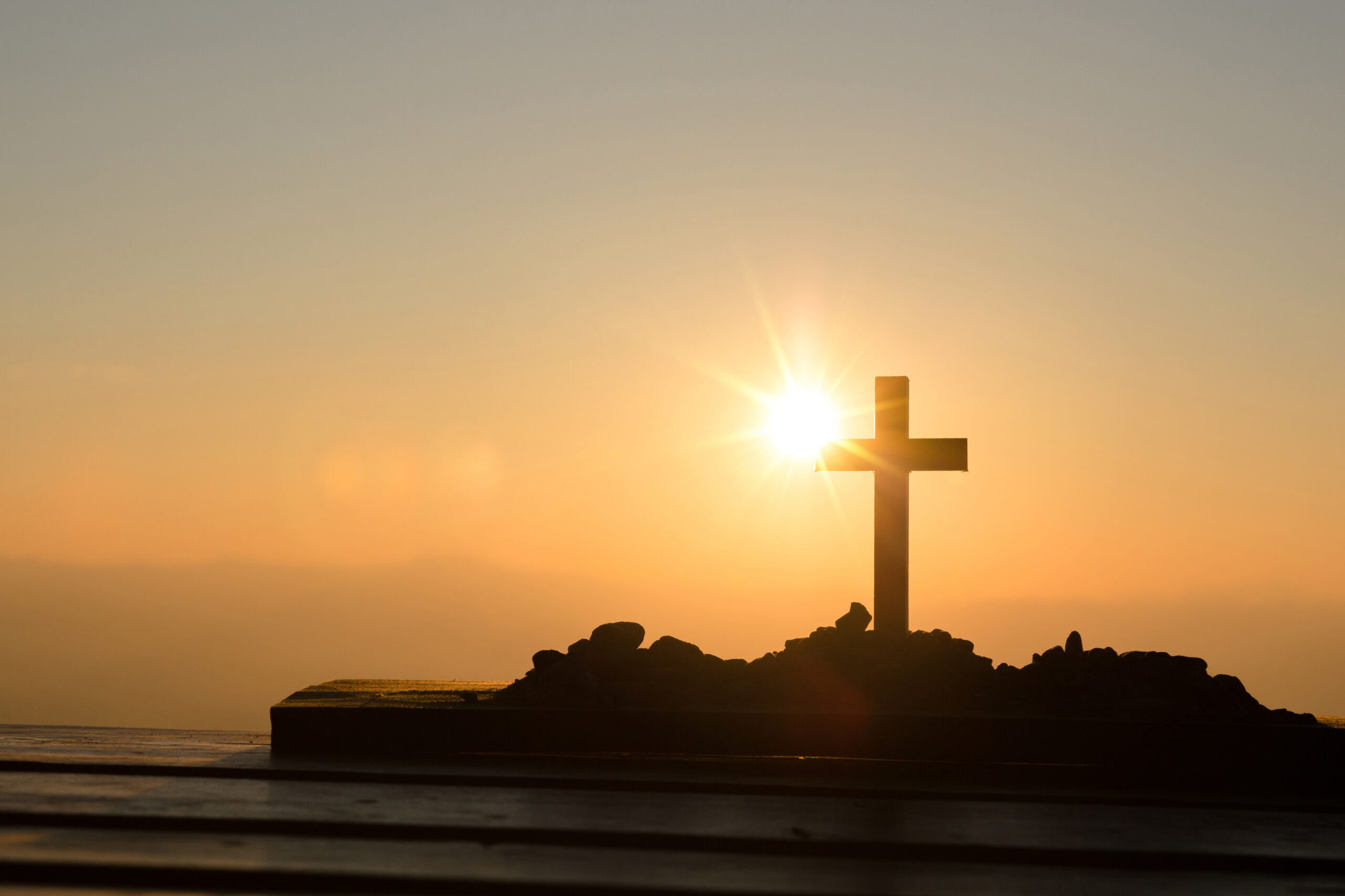 Resurrection concept:Crucifixion Of Jesus Christ Cross At Sunset